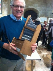 John Read with a Portative Organ, the bellows are under the base